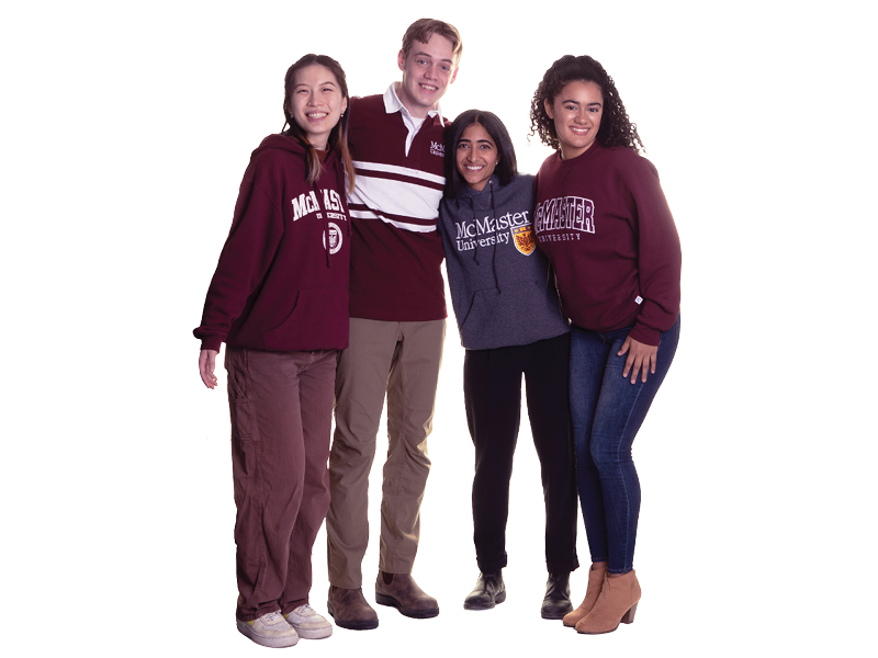 A group of smiling students wearing McMaster sweaters